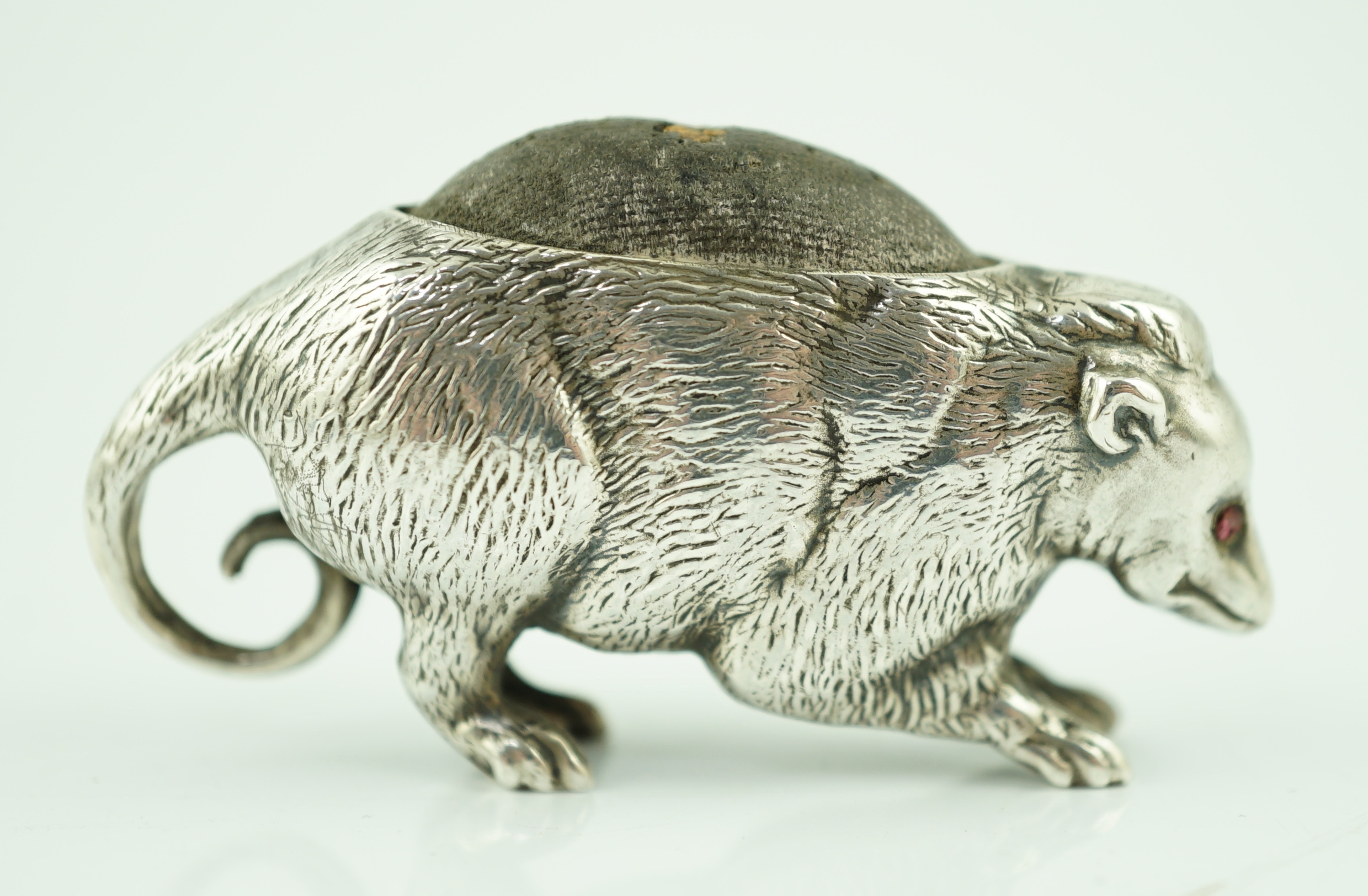 An Edwardian novelty silver pin cushion, modelled as a possum, Arthur Johnson Smith